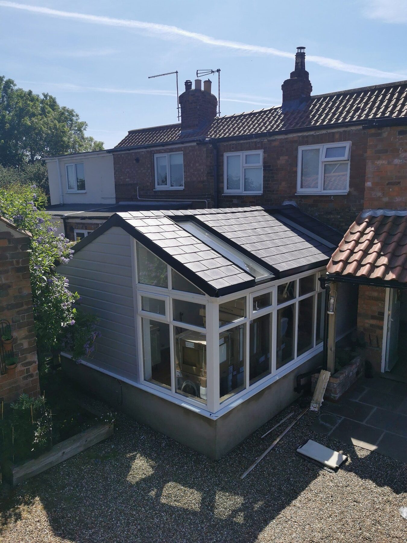 Lean-to on a terrace, with a skylight