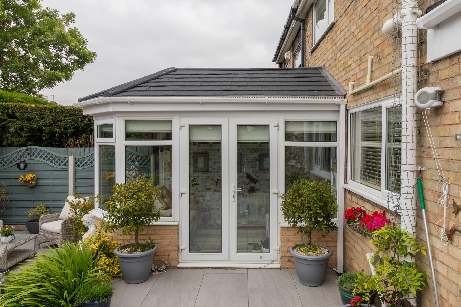 Edwardian conservatory, French doors kept