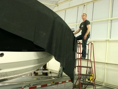 David & James working the 36ft x 15ft top sheet into shape