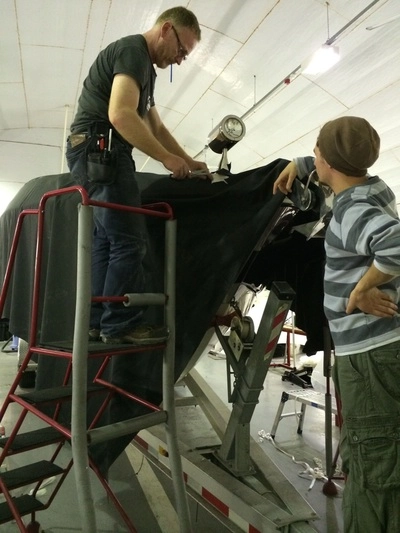 David & James working the 36ft x 15ft top sheet into shape