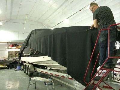 David & James working the 36ft x 15ft top sheet into shape