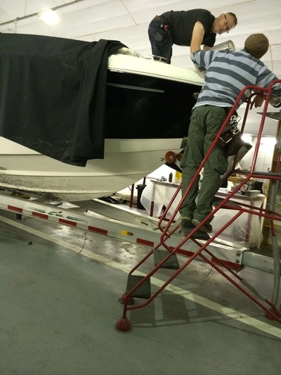 David & James working the 36ft x 15ft top sheet into shape