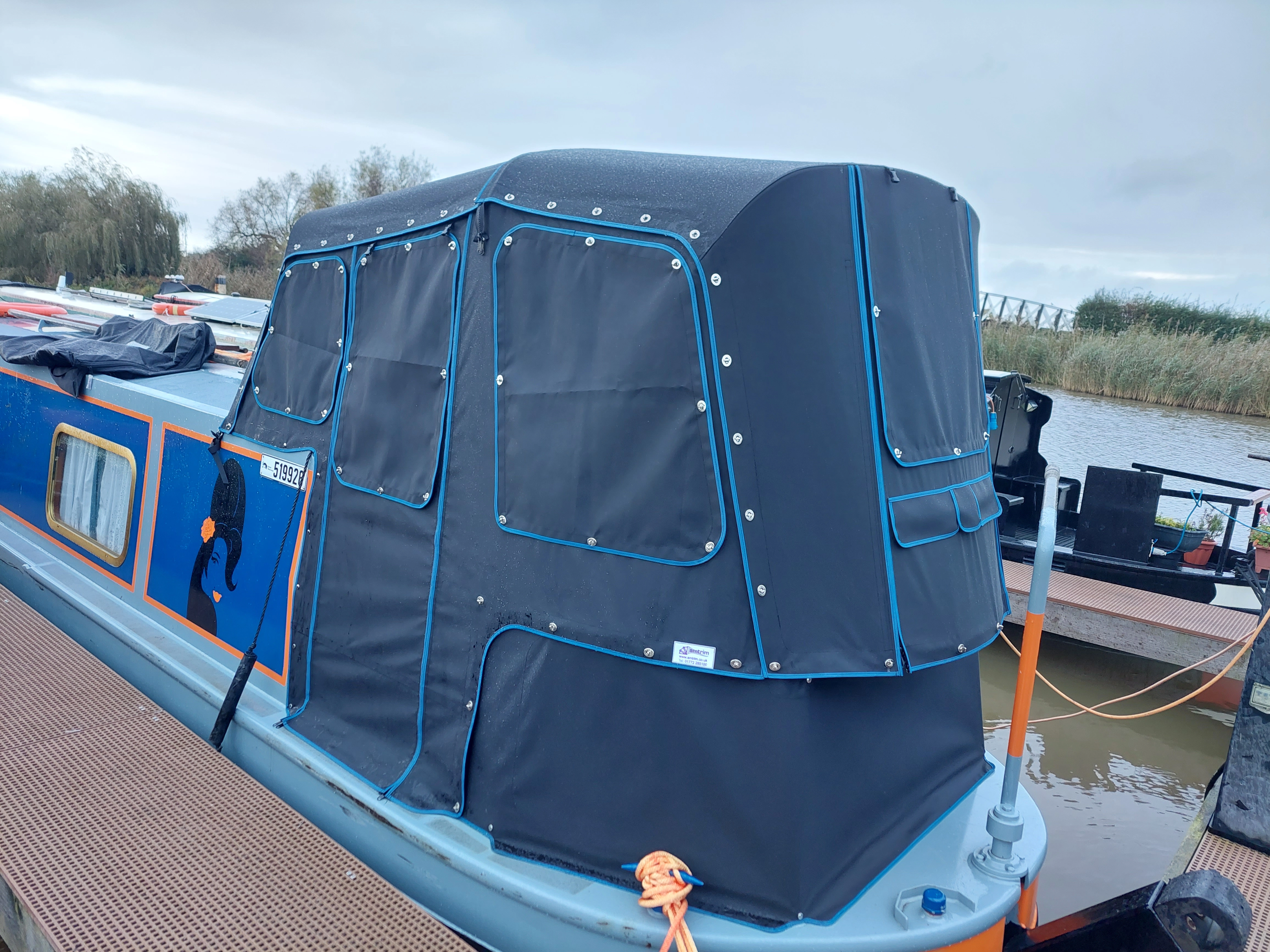 Cruiser stern canopy window covers