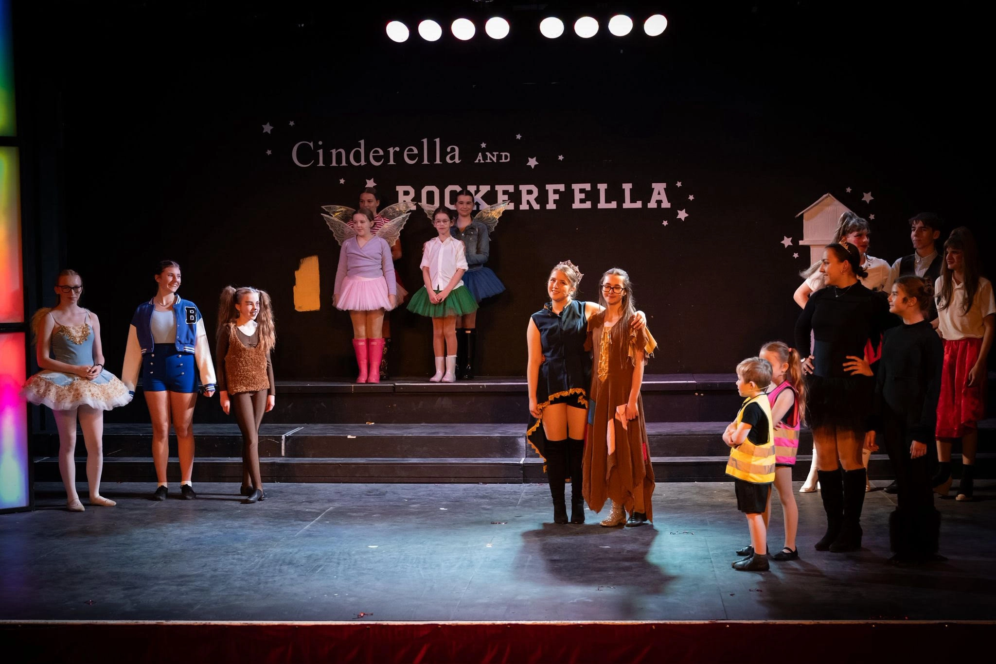 Principal cast all on stage for the final scene of Cinderella Rockerfella