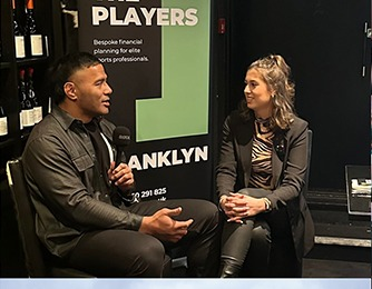 Interview — two guests on set, PLAYERS backdrop