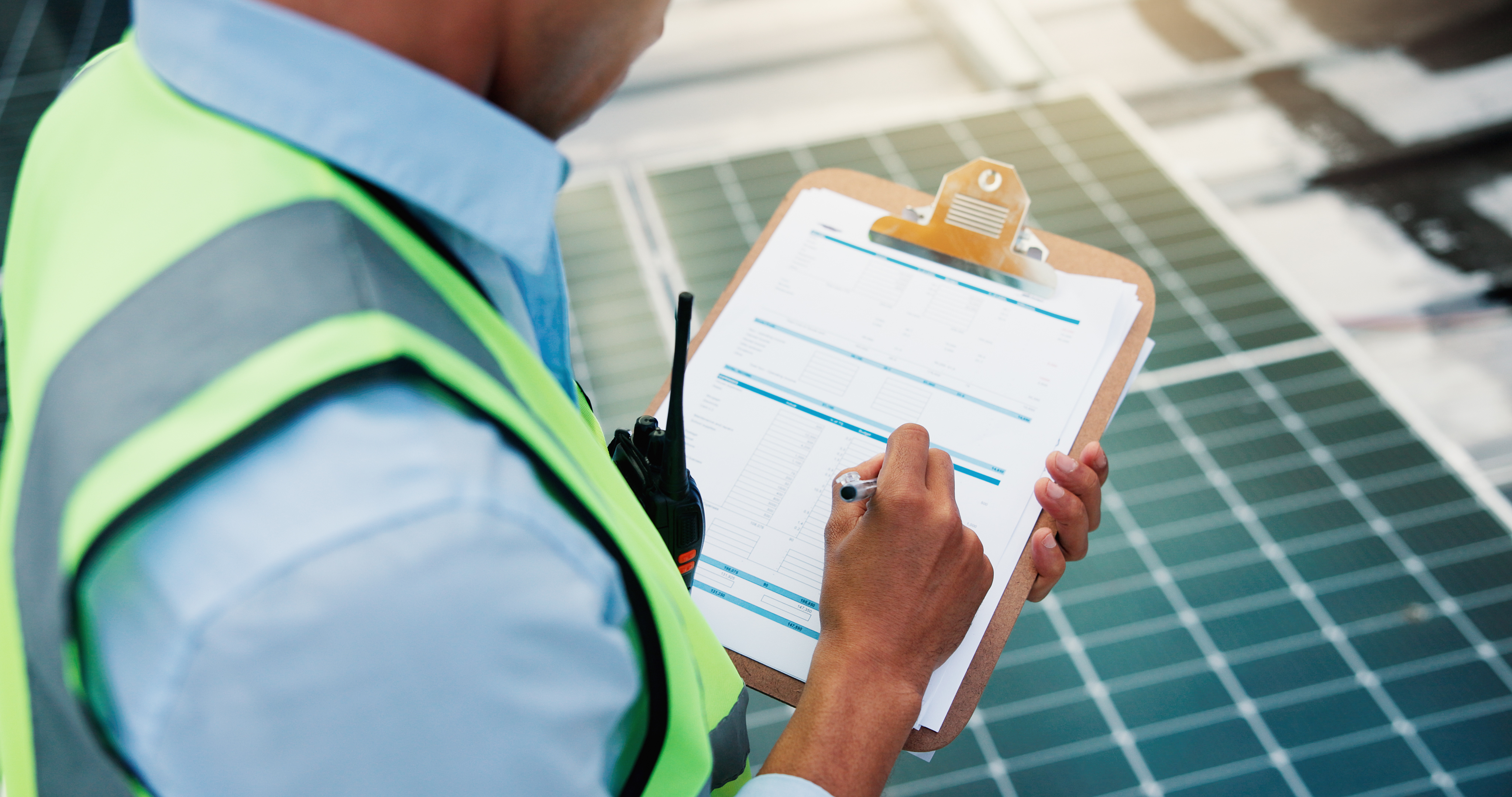 Solar panels, writing and hands with checklist, review power production and grid condition.