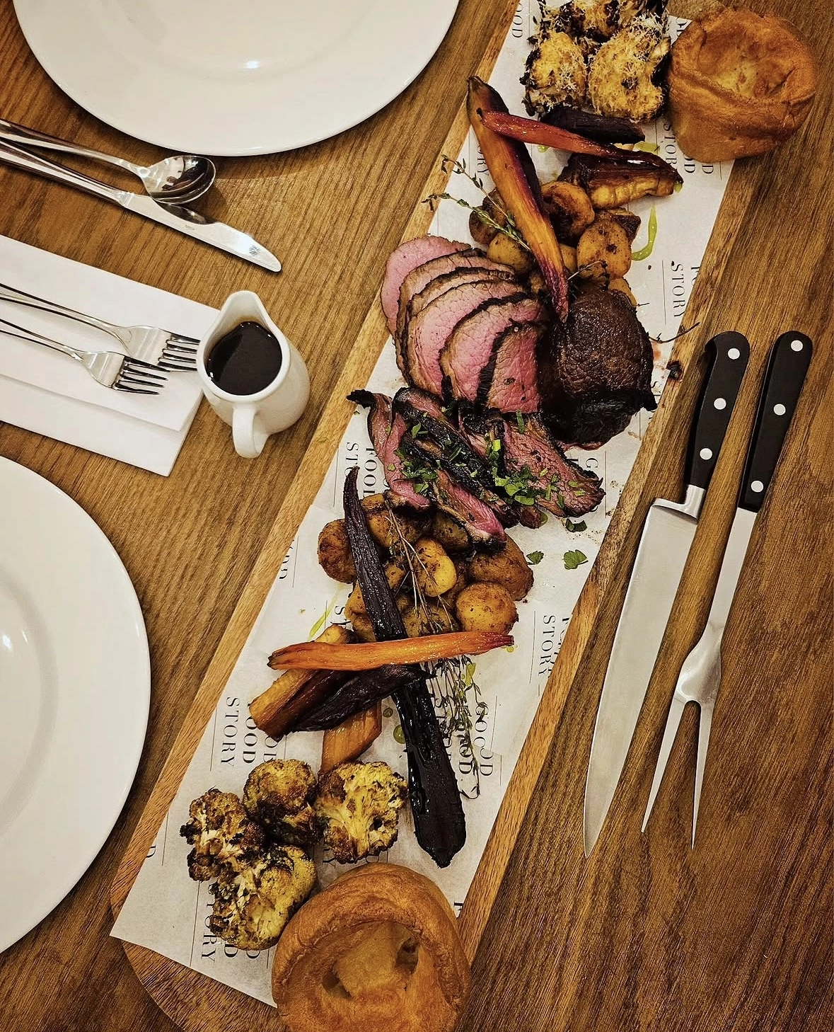 A traditional roast served on a wooden platter